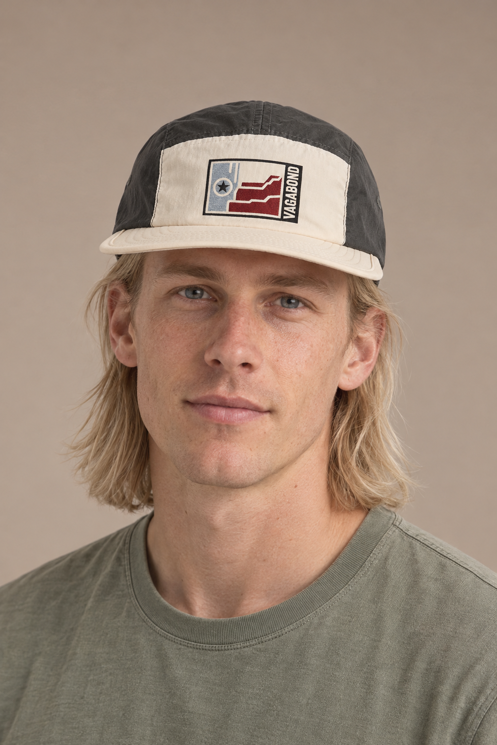 Vagabond finn — model photograph against warm beige studio background