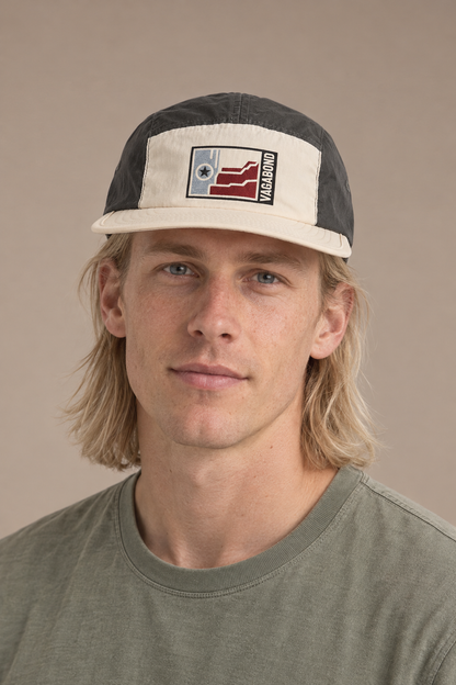 Vagabond finn — model photograph against warm beige studio background